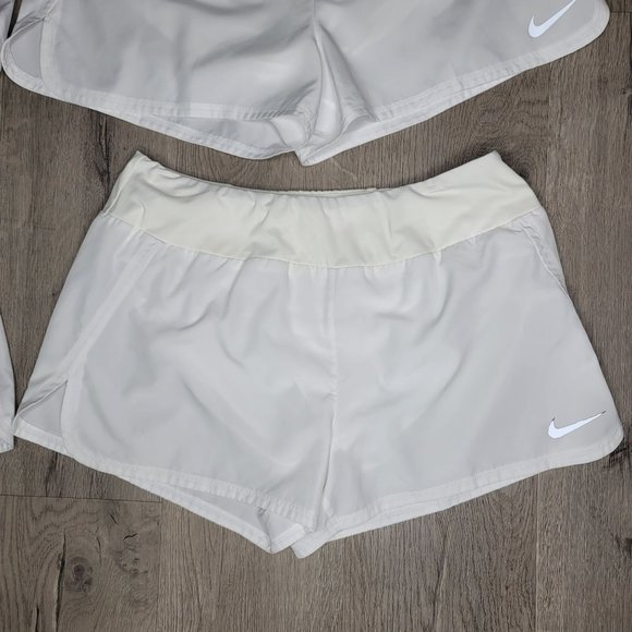 Nike dri fit white running shorts set of 4. pocket on back with lining size Larg - Picture 13 of 13